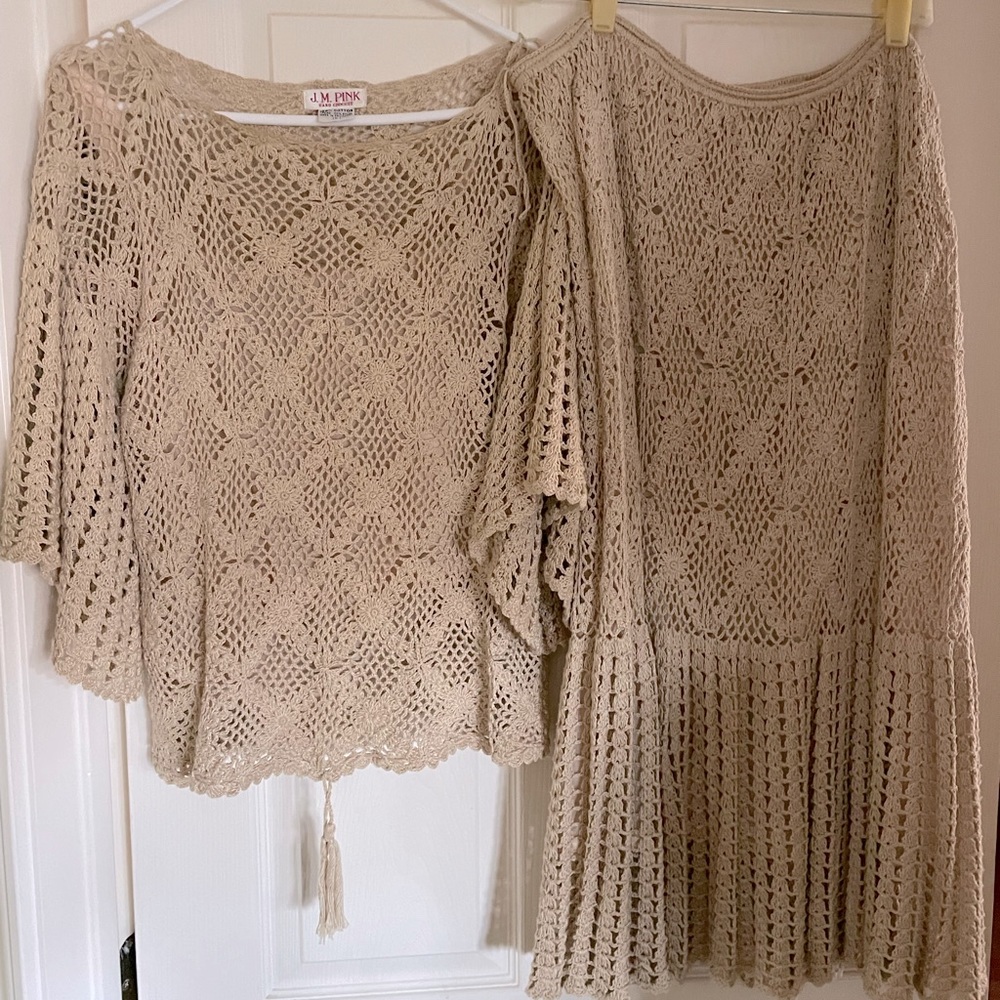 Cream crocheted skirt and top.